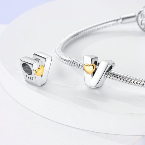 Zlatý stříbrný korálek Srdce s písmenem V